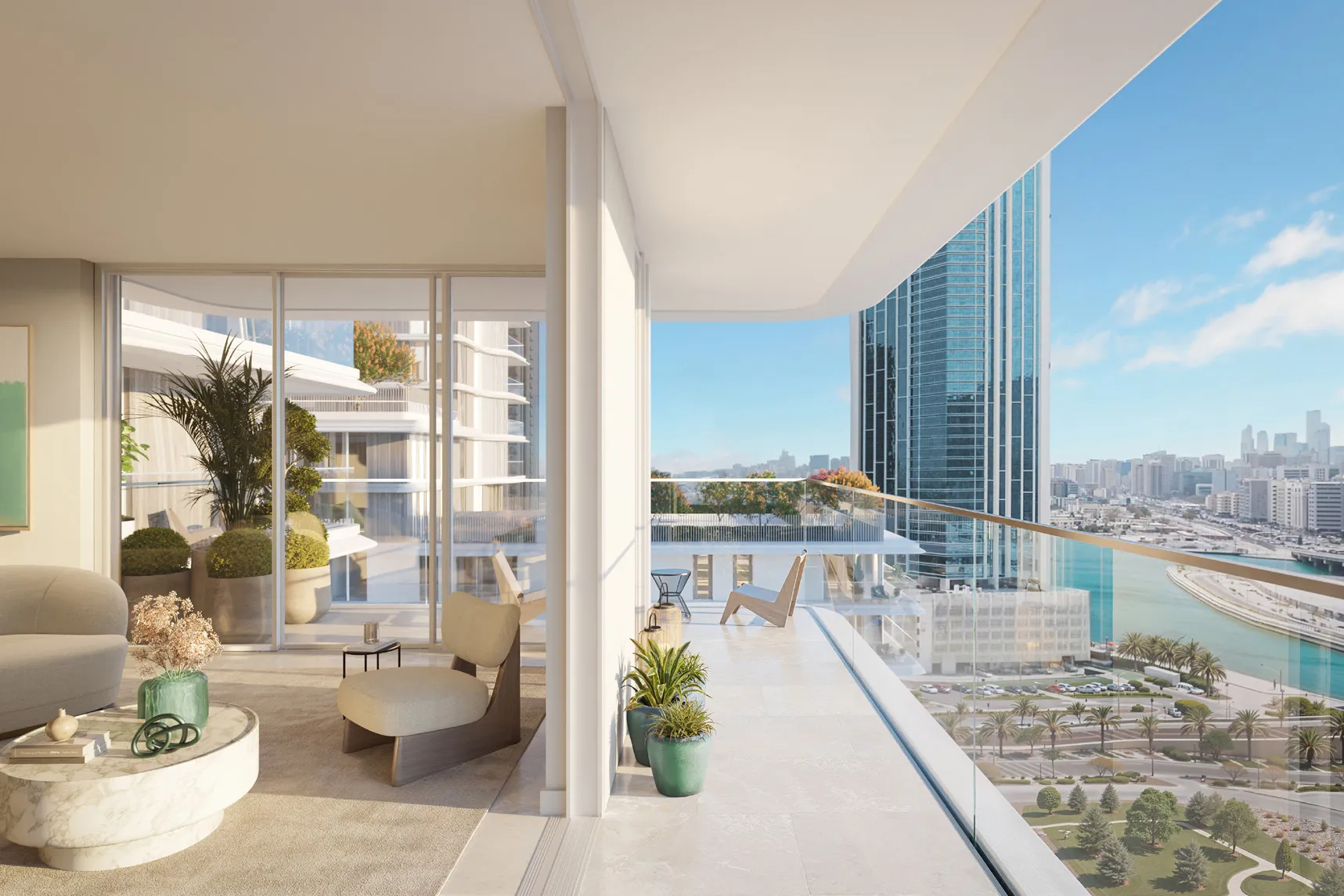 Living room opening onto a wide glass balcony overlooking water and city